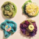 4 knitted broches